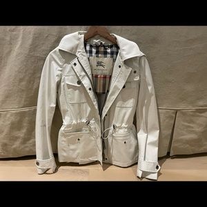 Burberry hooded raincoat, lined in Burberry signature checks.